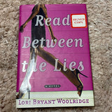 Read Between the Lies by Lori Bryant Woolridge